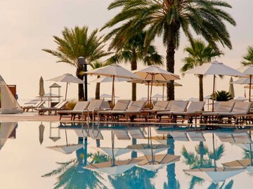 Pool und Palmen eines Hotels | © Club Med/Jeanne PERROTTE