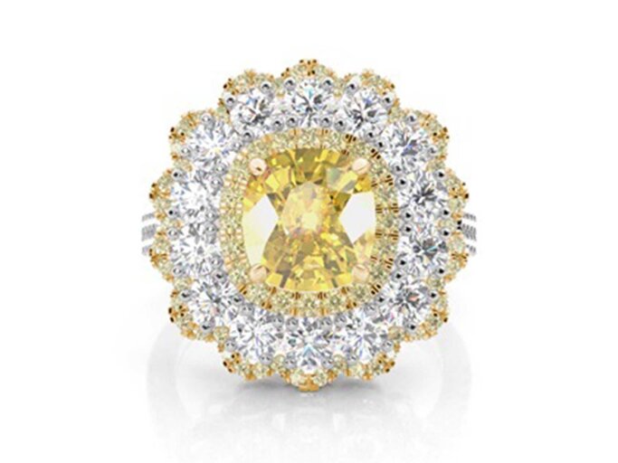 Ein Verlobungsring mit einer großen Ansammlung an weißen und gelben Diamanten in Blumenform. | © PR