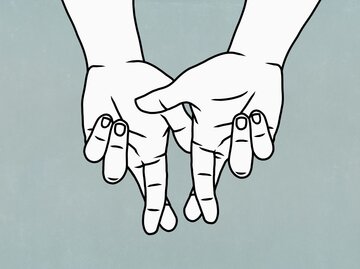 Illustration zwei Hände mit gekreuzten Fingern | © Getty Images/Malte Mueller
