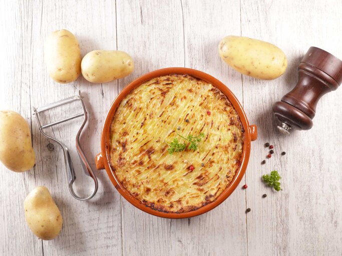 Gebackenes Kartoffel Püree mit Parmesan | © getty/margouillatphotos