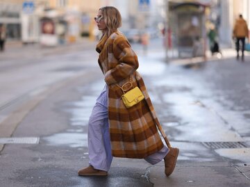 Influencerin Karin Teigl mit Ugg Boots | © Getty Images/Jeremy Moeller