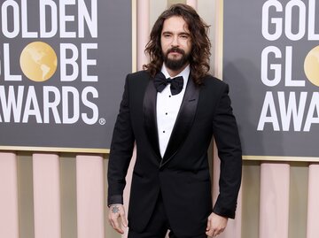 Tom Kaulitz bei den 80. Golden Globe Awards | © GettyImages/Daniele Venturelli / Kontributor