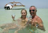 Heidi Klum mit Flavio Briatore beim Urlaub in Kenia im Dezember 2003 | © Getty Images | Gianni GIANSANTI 