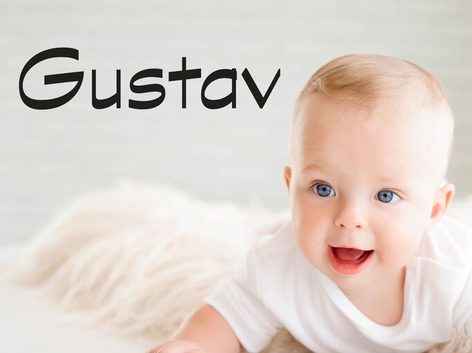 Lachendes Baby mit dem Jungennamen Gustav | © iStock | Nagaiets
