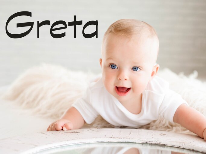 Süßes Baby mit dem Namen Greta | © iStock | Nagaiets