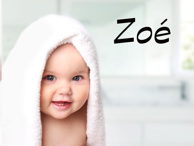 lachendes Baby mit dem Namen Zoe | © iStock.com | NYS444