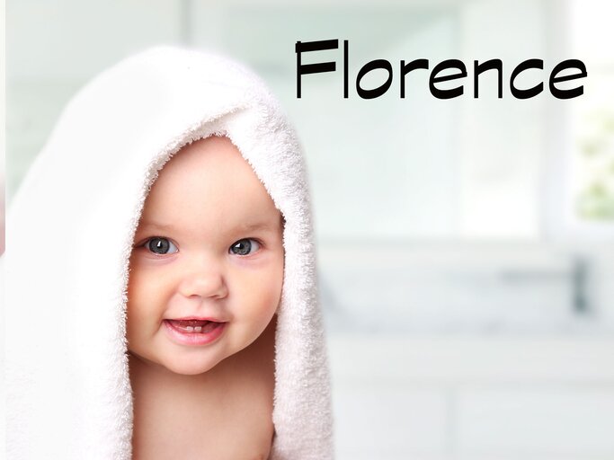 lachendes Baby mit dem Namen Florence | © iStock.com | NYS444