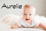 lachendes Baby mit dem Namen Aurelie | © iStock.com | Nagaiets