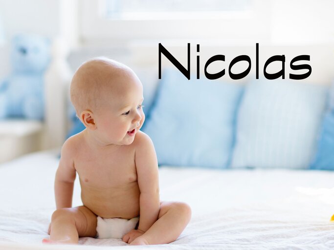 lachendes Baby mit dem Namen Nicolas | © iStock.com | FamVeld