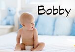 Süßes Baby mit dem Namen Bobby | © iStock.com / FamVeld