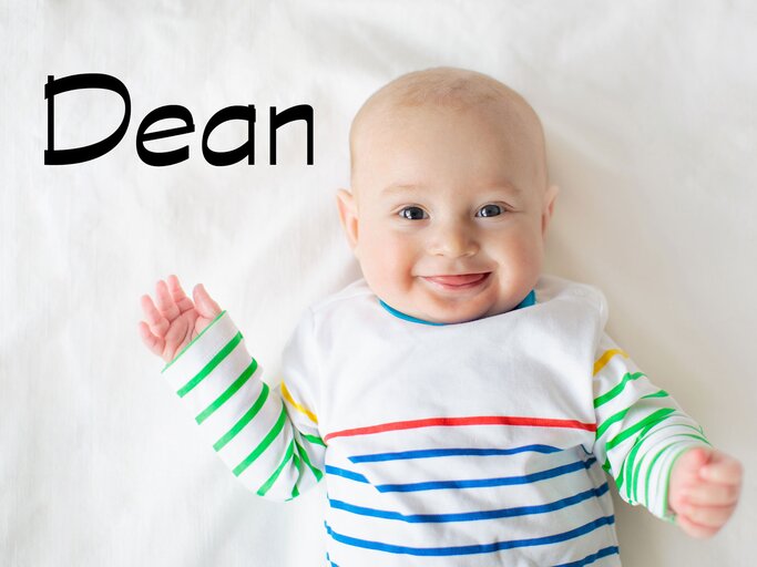 lachendes Baby mit dem Namen Dean | © iStock.com / FamVeld