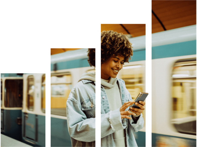 Junge Frau in einer Ubahn-Station sieht auf ihr Handy | © o2